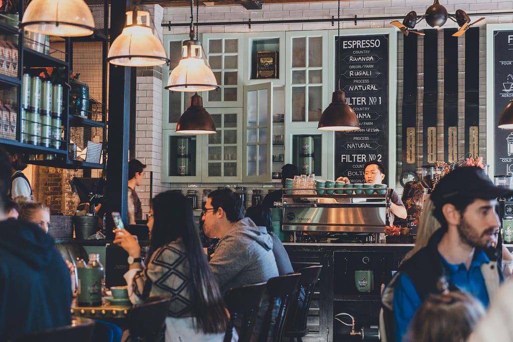 group-of-people-eating-on-restaurant-stockpack-unsplash | David Todd McCarty