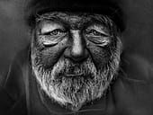 This portrait was taken on October 20, 2018 in the historic centre of Prague. A few years ago I rediscovered my passion for faces telling some story. I collect these portraits on the streets while waiting for the right moment. In an affort to make intimate portraits of beggars and homeless people I’m talking with them to capture the real emotion in them. They have lot of stories to tell. Those are stories where I usually lern something new. I especially look at their eyes, feel empathy and sometimes give them money. I let them tell their stories through pictures.